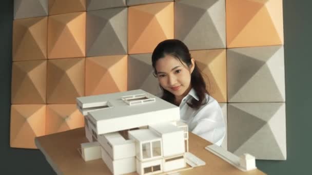 Skilled Attractive Architect Engineer Holds Architect Model While Checking Mistake — Stock Video