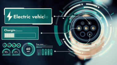 Kameranın önündeki EV şarj aletine odaklan. Görünmez iş adamı geçmişine sahip akıllı dijital batarya durum hologramını göster. Alternatif temiz enerji kullanan EV araba şarjı CO2 salınımını azaltıyor. İnceleyin