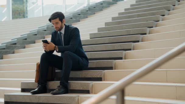 Smart Project Manager Looking Mobile Phone While Sitting Stairs Attractive — Stock Video