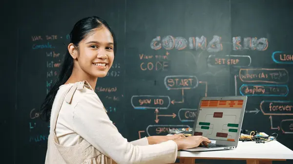 Caucasian Girl Working Laptop While Smiling Camera Blackboard Engineering Code — Stock Photo, Image