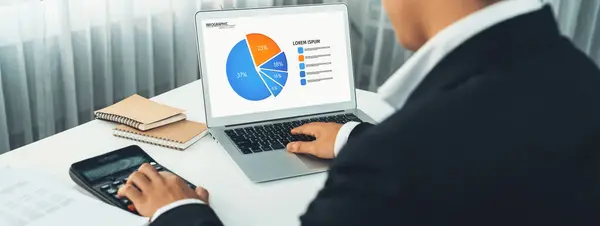 Business intelligence analyst use BI software on laptop to analyze financial data dashboard. Business technology empower corporate executive to make analytic strategic decision in panorama. Shrewd