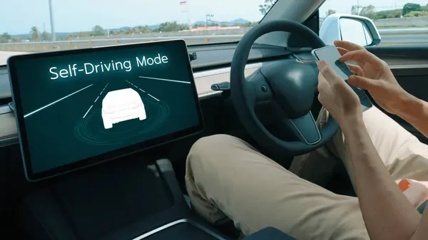 Self driving car or autonomous vehicle travel on speed highway with driverless system and autopilot mode allowing man driver relax and focus on smartphone without compromising safety. Perpetual