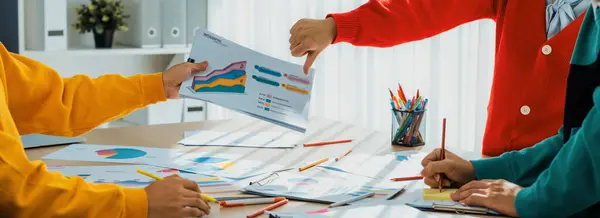 Startup employee working together, analyzing BI dashboard paper on financial data report but reject strategic marketing planning due to not aligned with company direction in panorama banner. Synergic
