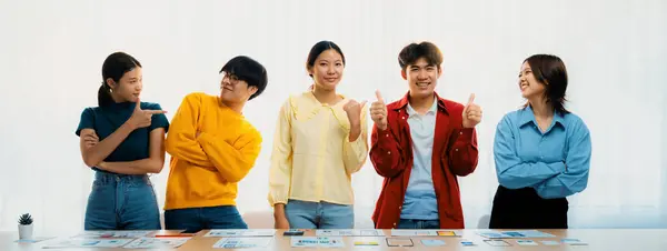 Panoramic banner young happy asian startup company employee wearing colorful casual wear stand in line together symbolize creative teamwork, job employment, HR agency recruitment. Synergic