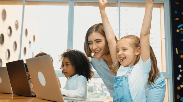Smart Student Celebrate Successful Project Raising Hand While Teacher Looking — Stock Photo, Image