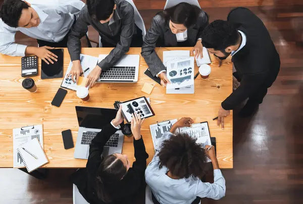 stock image Top panorama view business presentation data analysis dashboard on TV screen in modern meeting. Corporate presentation with group of business people in conference room. Concord