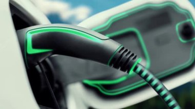 Işıklı kabloyla elektrik şarj etmek için elektrikli arabaya takılan EV şarj aleti. Kesme-Sınır yeniliği ve gelecekteki yeşil enerji sürdürülebilirliği. İnceleyin