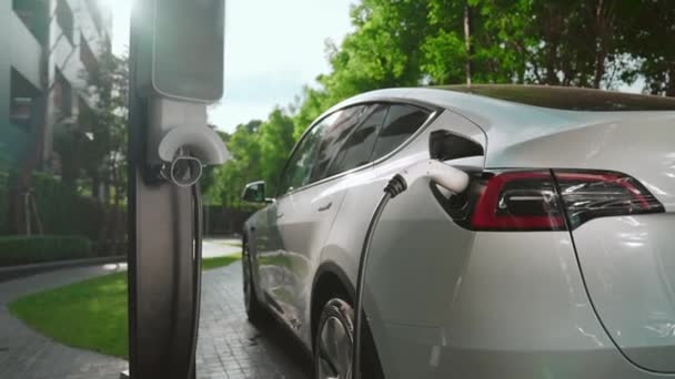 Slow Motion Electric Car Charging Green Sustainable City Outdoor Garden — Stock Video
