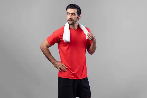 Full body length gaiety shot athletic and sporty young man in fitness exercise posture on isolated background. Healthy active and body care lifestyle.
