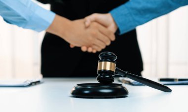 Lawyer acting as legal mediator successfully broke a compromise and seal with handshake between two parties to resolve business dispute through negotiation at law firm office. Panorama Rigid clipart