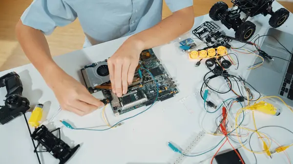 Closeup Boy Hand Fixing Motherboard Electronic Tool Table Top View — Stock Photo, Image
