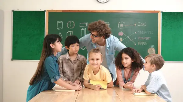Caucasian Smart Teacher Diverse Student Looking Camera Classroom Group Happy — Stock Photo, Image