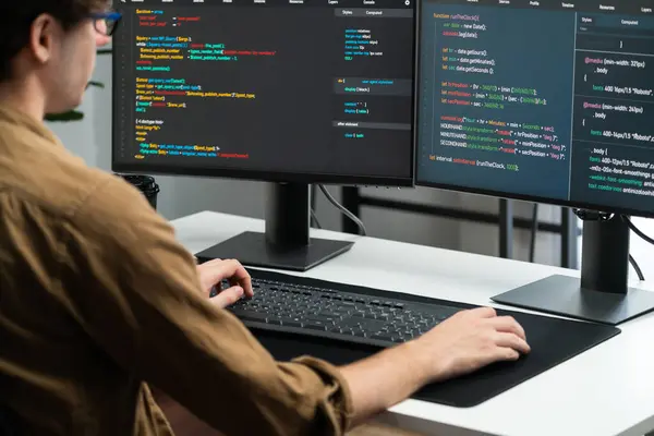 Developer Working Online Software Development Monitors Modern Home Office Coding — Stock Photo, Image