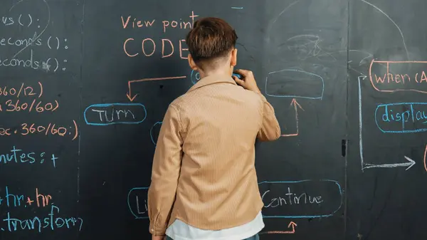Back View Smart Boy Writing Engineering Prompt Blackboard Attractive Happy — Stock Photo, Image