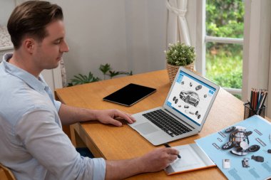 Car design engineer analyze car prototype for automobile business at home office. Automotive engineering designer carefully analyze, finding flaws and improvement for car design with laptop Synchronos clipart