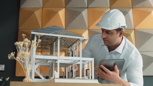 Closeup Professional Caucasian Male Architect Engineer Inspect Check House Model — Stock Video