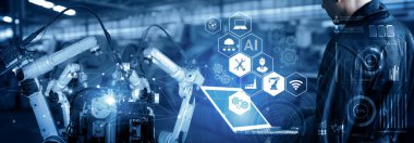 XAI Smart Endüstri 4.0 veya 4. endüstriyel devrimin otomasyon üretim sürecini ve IOT yazılımını gösteren dijital fabrika üretim teknolojisi için robot kolları.