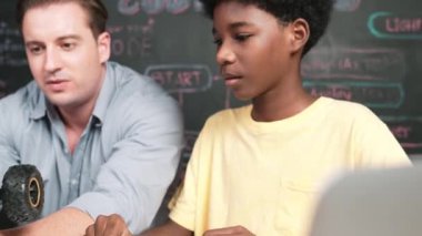 Akıllı öğretmen araba modelini farklı öğrencilere denetliyor. Melez ırk dinleyen liseli çocuklar masada dizüstü bilgisayarı ve kabloları olan robot model sistemini açıklıyor. Öğretim