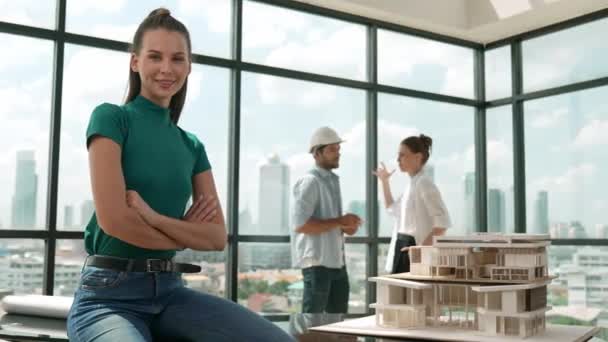 Young Beautiful Interior Designer Crossing Arms While Engineer Team Talking — Stock Video