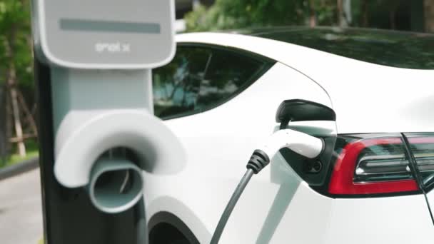 Slow Motion Electric Car Charging Green Sustainable City Park Outdoor — Stock Video