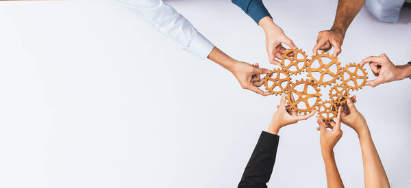 Top panorama banner of business team joining cogwheel in circular together symbolize successful group of business partnership and collective teamwork in workplace with productive efficiency. Prudent