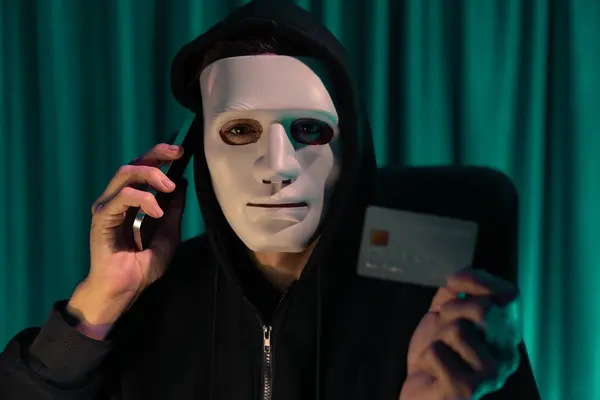White Criminal Anonymous Mask Calling Credit Card Owner Threaten Ransom — Stock Photo, Image