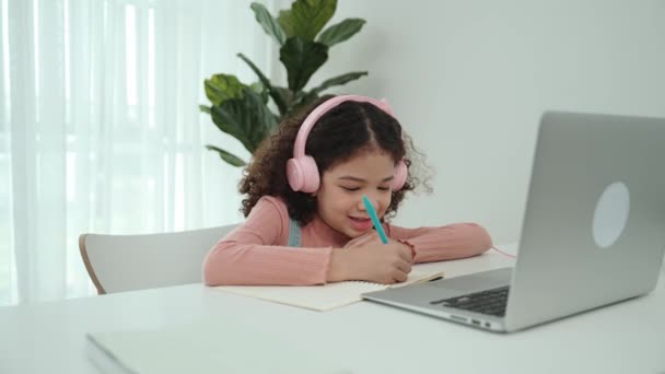 Cute American Girl Wearing Headphone Doing Homework Self Study Happy — Stock Video