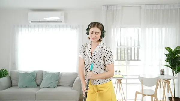 Smiling Housekeeper Headphone Listen Music While Cleaning Floor Happy Caucasian — Stock Photo, Image