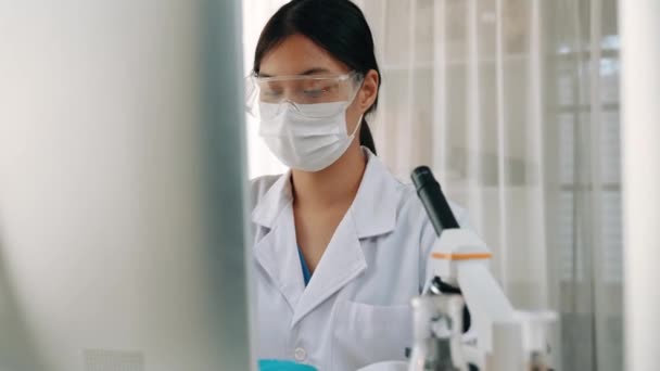 Laboratory Chemistry Researcher Develop New Medicine Cure Using Microscope Laptop — Stock Video