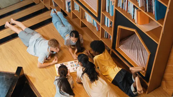 Group Diverse Children Lying Circle While Reading Book Library Top — Stock Photo, Image