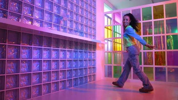 Happy Hispanic Girl Lively Mood Moving Music Neon Light While — Stock Photo, Image