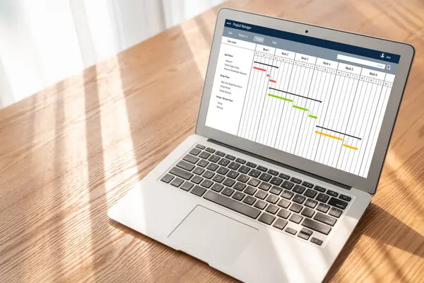 stock image Project planning software for modish business project management on the computer screen showing timeline chart of the team project