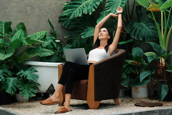 Modern Young Woman Working Remotely Relaxing Solitude Minimalist Architectural Concrete Royalty Free Stock Images