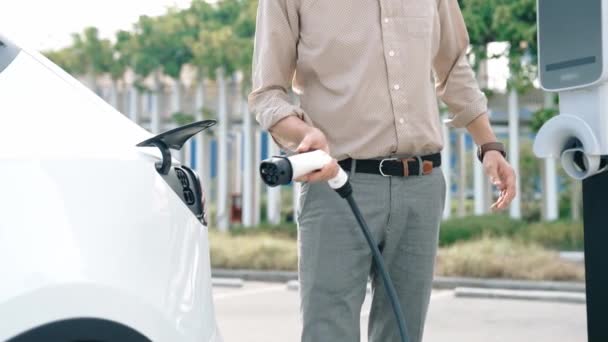 Slow Motion Man Put Charger Recharge Electric Cars Battery Charging — Stock Video