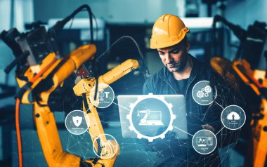 Sanayi 4.0 veya 4. endüstriyel devrimin otomasyon üretim sürecini ve IOT yazılımını gösteren dijital fabrika üretim teknolojisi için MLB Smart endüstri robot kolları.