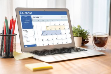 Calendar on computer software application for schedule planning for personal organizer and online business snugly
