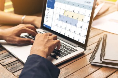 Calendar on computer software application for schedule planning for personal organizer and online business snugly