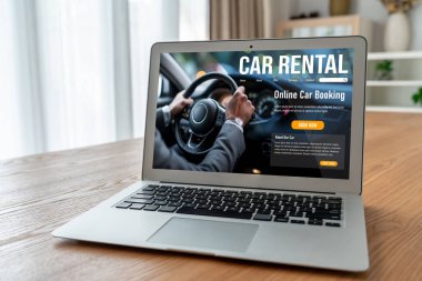 car rental website on computer screen for tourist to rent a car for transportation snugly
