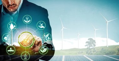 Rüzgar türbini çiftliği ve yeşil yenilenebilir enerji işçisi arayüzü üzerinde çalışan iş adamlarının çifte görüntüsü. Alternatif enerji ile sürdürülebilirlik gelişimi kavramı. uds