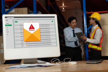 Cyber attacking concept. Malware alert showing on computer screen display scam and threat detection on computer system or online server to be removed snugly.
