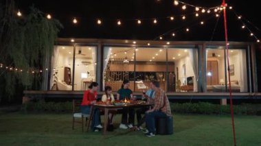 Family together for holiday celebration in garden. Family member gather have dinner. Outdoor picnic activity to relax with food and spend time with cute relatives cross generation gap. Divergence.