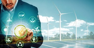 Rüzgar türbini çiftliği ve yeşil yenilenebilir enerji işçisi arayüzü üzerinde çalışan iş adamlarının çifte görüntüsü. Alternatif enerji ile sürdürülebilirlik gelişimi kavramı. uds
