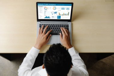 Computer software for website traffic analytics data on computer screen. Concept of SEO search engine optimization and customer targeting for online business snugly