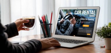 car rental website on computer screen for tourist to rent a car for transportation snugly