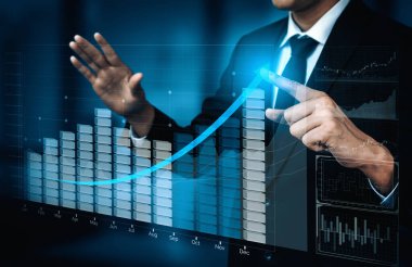 İş ve Finans 'ın Çifte Maruz Kalıbı - Karnesi olan İşadamı, borsa yatırımlarının mali kar artışına doğru ilerledi. uds