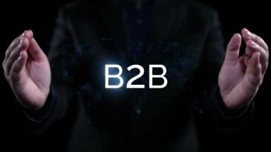 İş adamı B2B peyzajında geziniyor, iş-iş bağlantılarını geliştirmek için kullanım teknolojisi kullanıyor. B2B etkileşimini yeniden şekillendiren keşifler, iş-iş stratejilerinde yenilikleri yönlendiren araçlar. Kullanıcı Kimliği