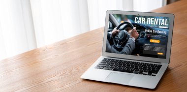 car rental website on computer screen for tourist to rent a car for transportation snugly