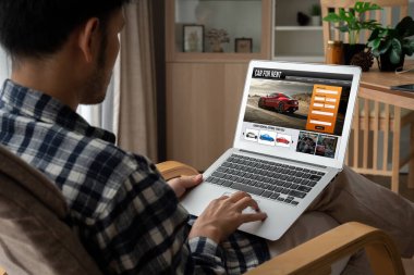 car rental website on computer screen for tourist to rent a car for transportation snugly