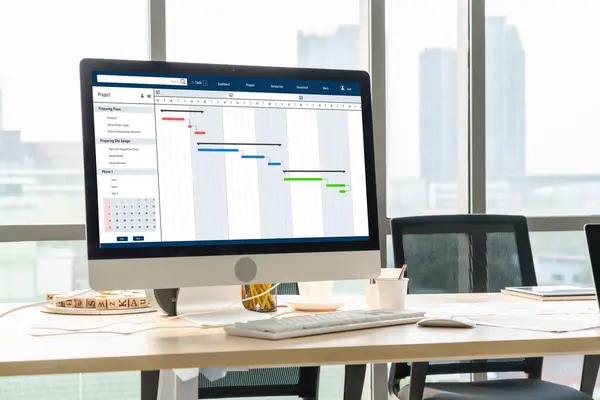 stock image Project planning software for modish business project management on the computer screen showing timeline chart of the team project