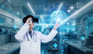 Doctor wearing VR glasses and lab coat pointing at medical data while managing augmented reality technology and standing at laboratory with blurring background. Healthcare and innovation. Ingenuity. clipart